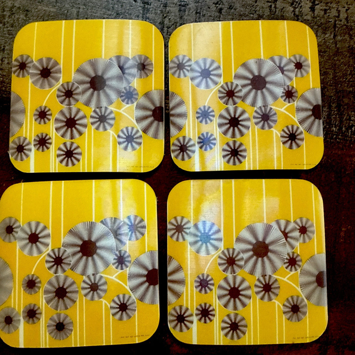 Vintage brown on yellow spinning gears lenticular coasters set of 4