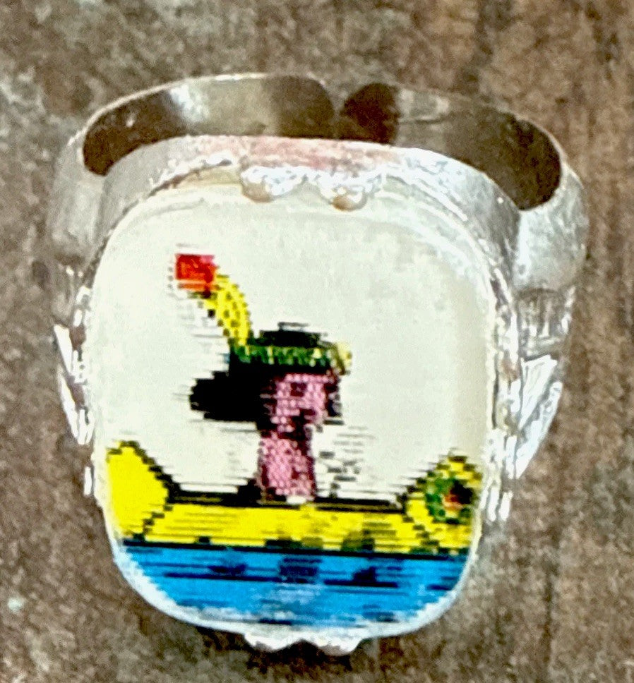 1960s Vari-Vue flicker toy prize boy paddling canoe ring