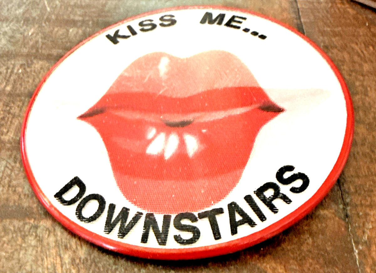 Vintage Vari-Vue Kiss Me Downstairs pin badge 1960s