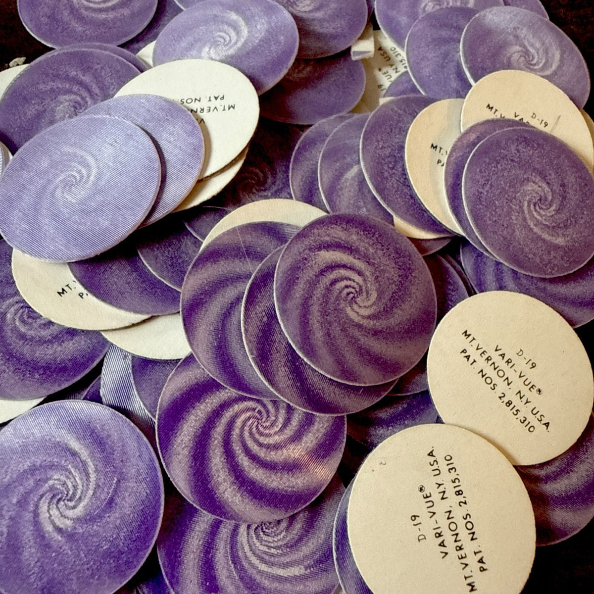 Purple and white Vari-Vue 1960s hypnotic swirls small lenticulars