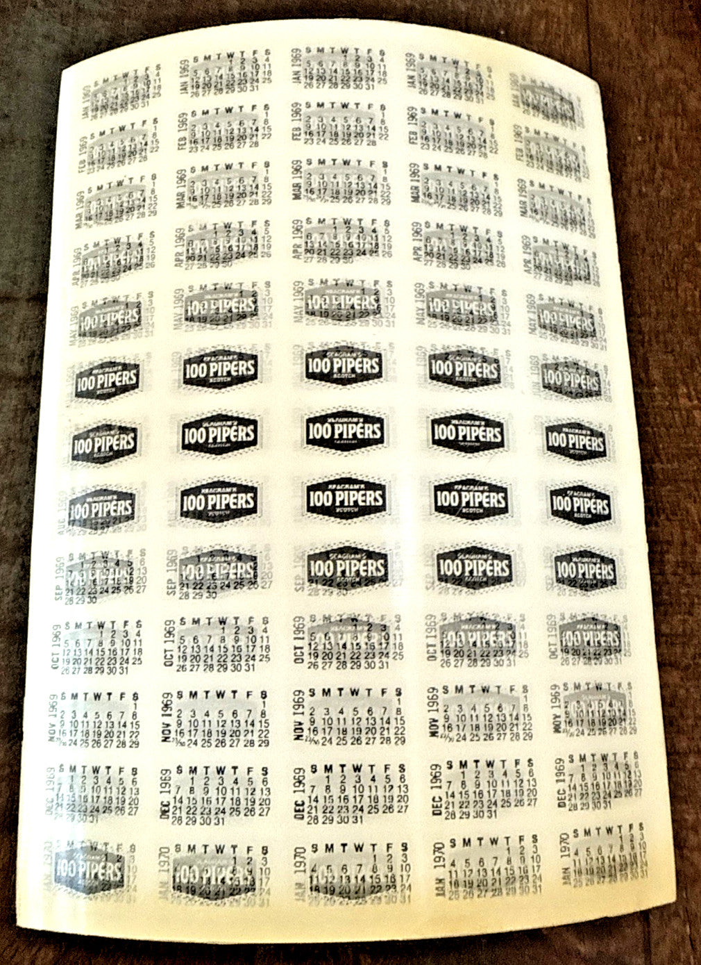 1969 Vari-Vue Seagrams 100 Pipers Scotch lenticular calendar