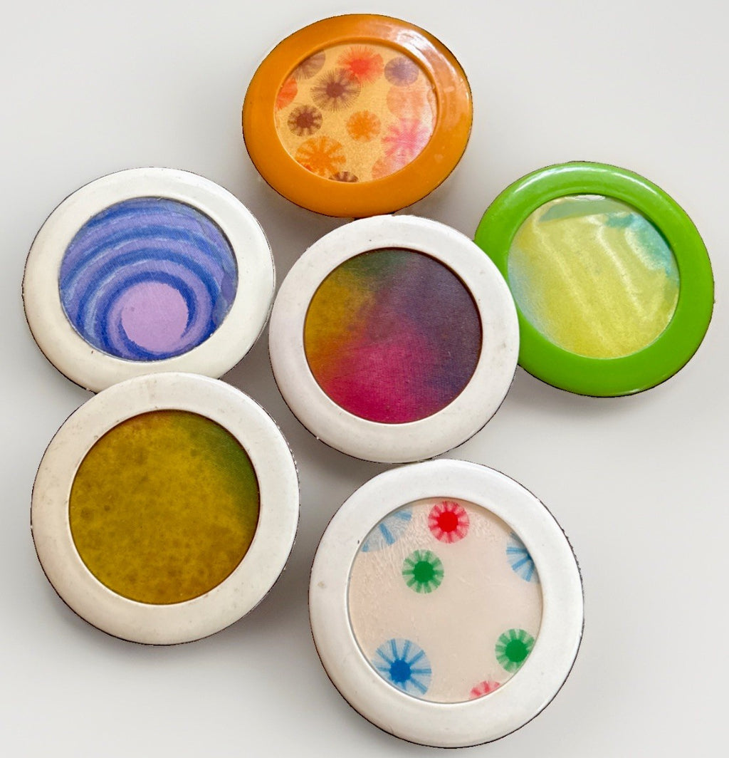 1960s Vari-Vue psychedelic gears wave interchangeable badges