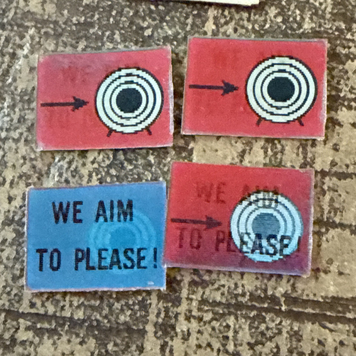 1960s Vari-Vue small bullseye We Aim To Please unused ring inserts