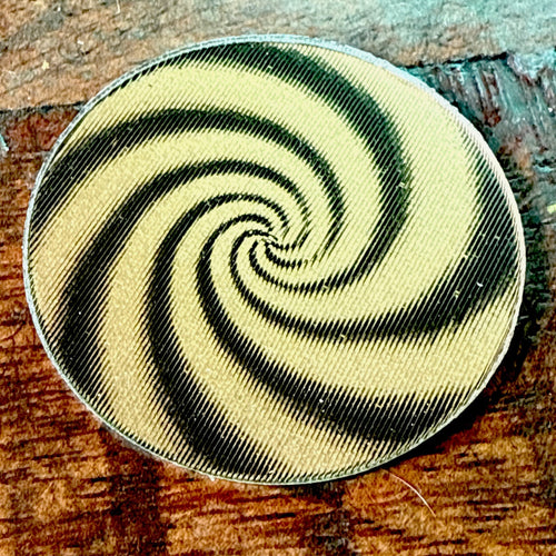1960s Vari-Vue gold and black hypnotic swirls lenticular