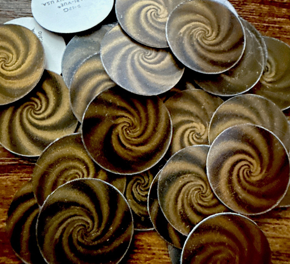 Black and gold hypnotic swirls 1960s Vari-Vue lenticular flickers
