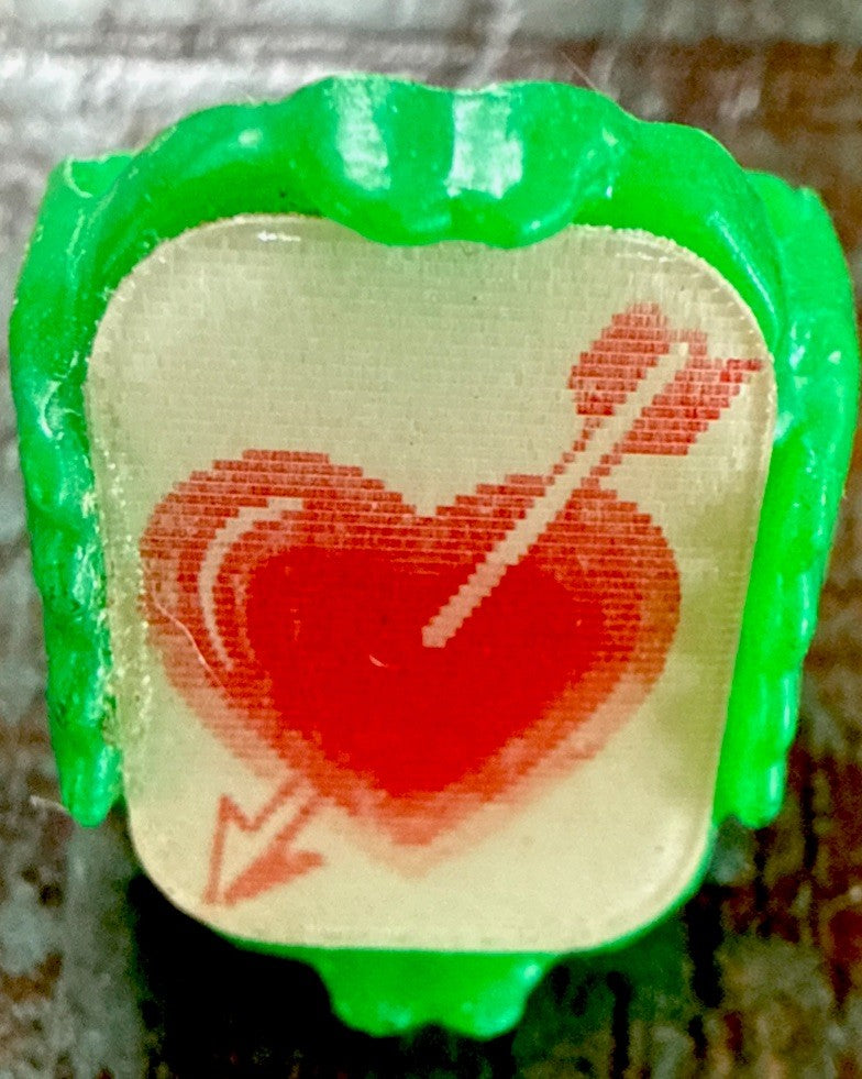 1960s gumball flicker ring arrow through heart Vari-Vue